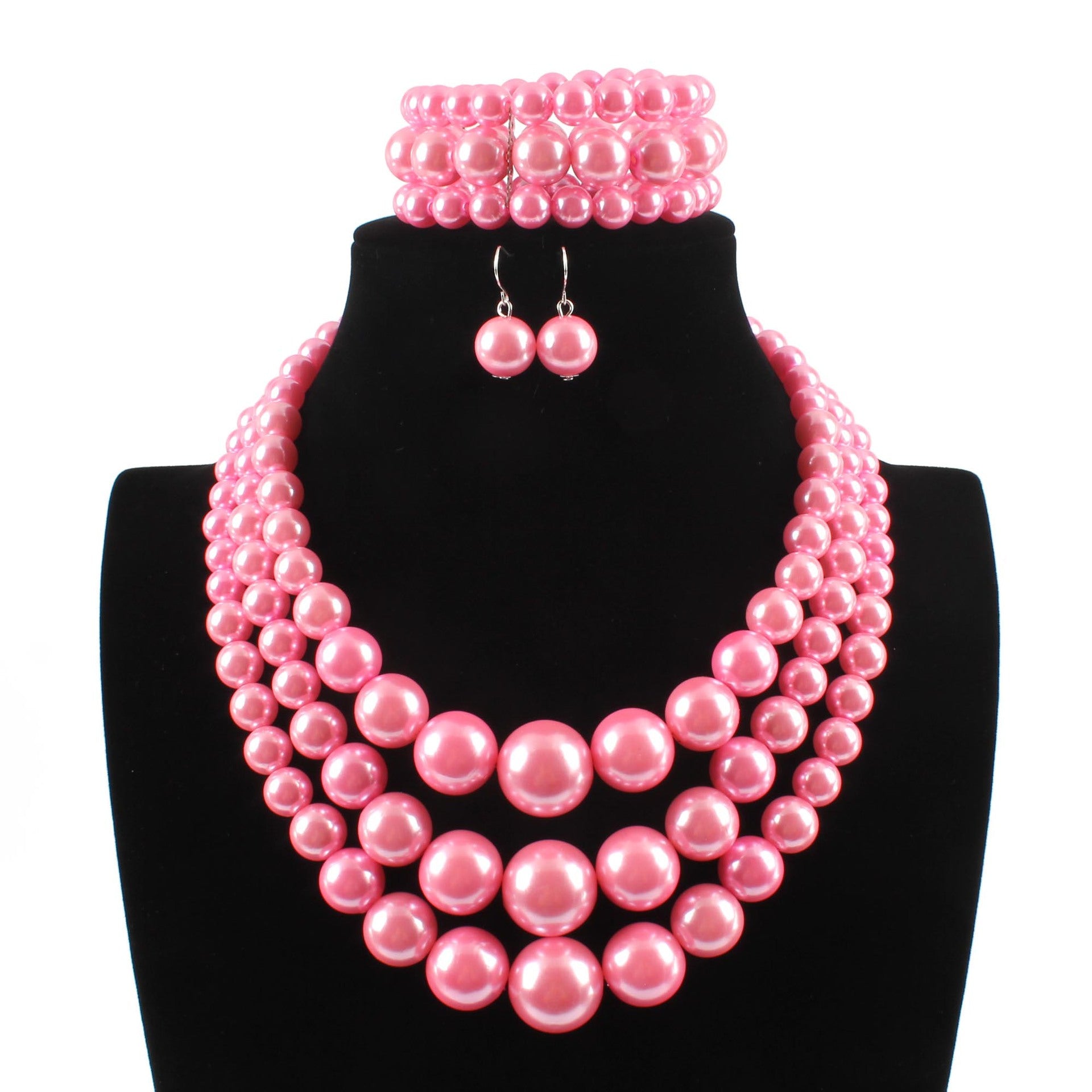 Comercio al por mayor de perlas de imitación de plástico pendientes collar conjunto de joyas